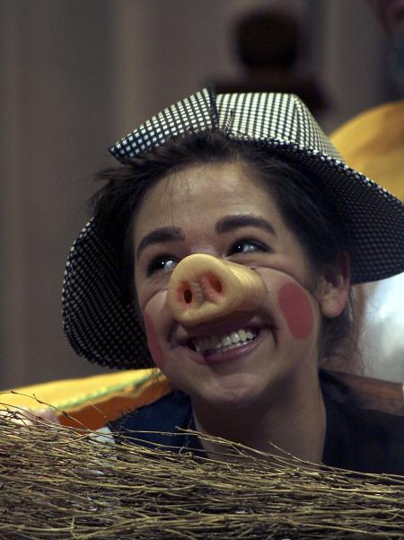 Kali Wagner as Marcellus the Pig in the Union University Players' production of <em>The Trial of the Big Bad Wolf</em>. - Photo by Kyle Kurlick