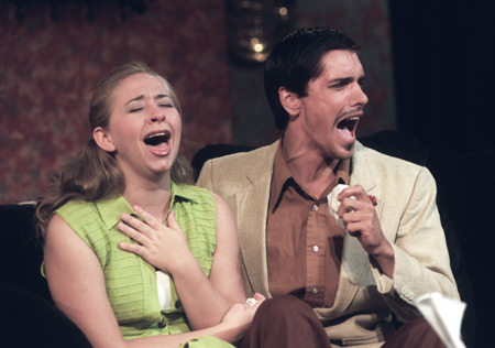 Miranda Wallace and Ryan Schunemann cry about their <i>espouses</i> in <i>The Odd Couple.</i> - Photo by Jim Veneman