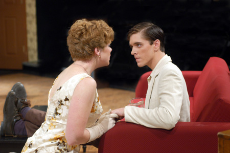 Emily Brown as Miranda Frayle shares with Ryan Schunemann as Don Lucas in <i>Relative Values</i>. - Photo by Jim Veneman