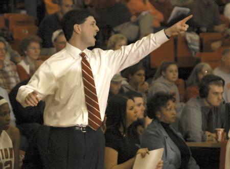 Lady bulldogs coach Mark Campbell leads his team against Vanguard University during the Rotary Classic tournament. - Photo by Matthew Diggs