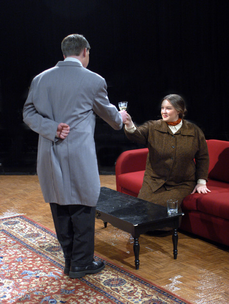 The family butler, Crestwell, played by Jeremy Parker serves Lindsey Garner as Mrs. Dora Moxton in <i>Relative Values</i>. - Photo by Jim Veneman