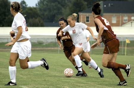 Junior Cheslie Tharpe dribbles the ball through traffic versus Loyola University New Orleans. The Lady Bulldogs won the game 2-1 for their fourth victory of the season. - Photo by Matthew Diggs