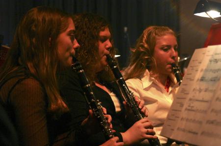 Amy Hines, Stephanie Berry and Mallory Grisham play the clarinet with the Symphonic Band during A Union Christmas. - Photo by Stephanie Schroeder