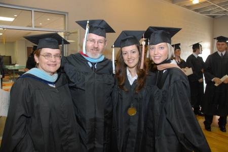 Three members of the Betts family graduated from Union University Dec. 16. Pictured from left are Union registrar Jane Betts, her husband Steve and his two nieces, Jenni Betts and her sister Melissa Betts Alexander. - Photo by Morris Abernathy