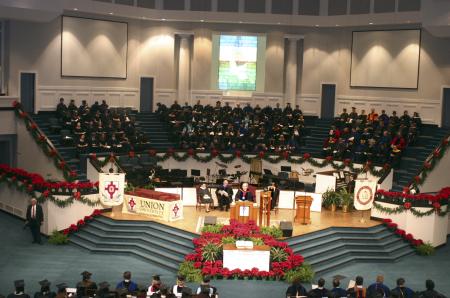 President Dockery speaks to the graduates during the graduation ceremony held at West Jackson Baptist Church. - Photo by Stephanie Schroeder