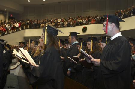 Graduates sing a hymn during the fall graduation ceremony held at West Jackson Baptist Church. - Photo by Stephanie Schroeder