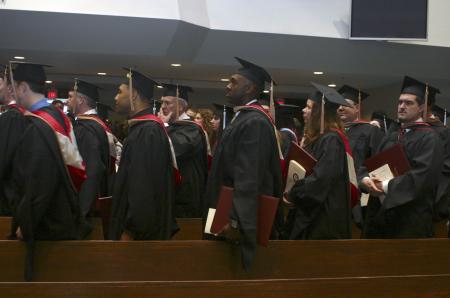 New graduates leave with diplomas in hand and heads held high. - Photo by Stephanie Schroeder