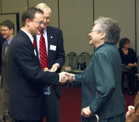 Greg Thornbury, dean of the school of Christian studies, and James Patterson, associate dean of the school of Christian Studies, congratulate Emily Cox for recieving the Robert E. Craig Service Award. 
 - Photo by Matthew Diggs
