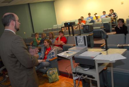 Joshua Veltman, assistant professor of music, teaches an Arts in Western Civilization class. - Photo by Morris Abernathy