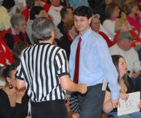 Lady Bulldog Head Coach Mark Campbell gives an official a playful look during the TranSouth Tournament. - Photo by Morris Abernathy