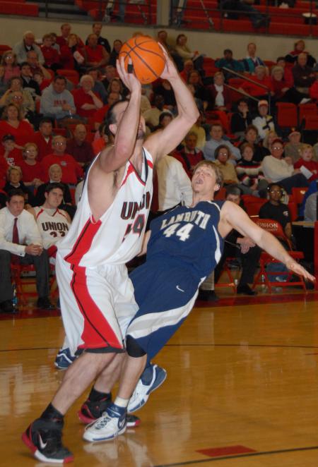 Ben Frederick (44) makes a move against a Lambuth defender during the semi-final matchup of the TranSouth Tournament. - Photo by Morris Abernathy