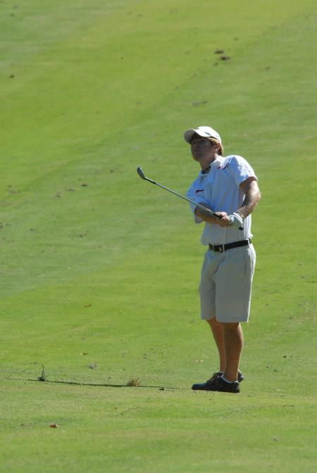 Matt Kelley watches as he takes a shot from the fairway during the Union Invitational at Falcon Ridge Golf Club. - Photo by Morris Abernathy