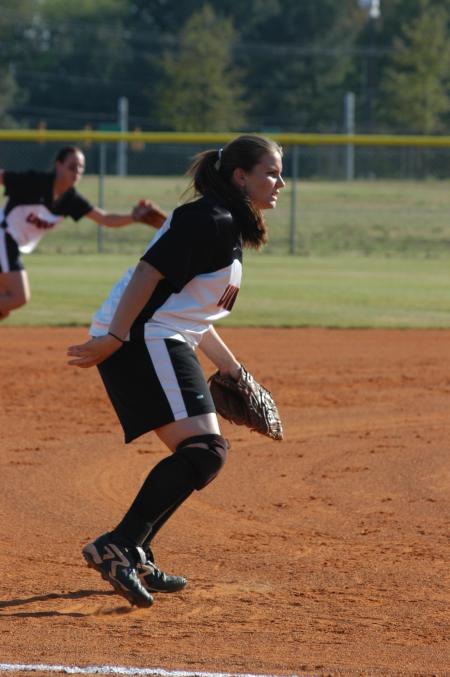 Mandy Elder gets ready for a play at third base.  Shortstop Ashley Walters reacts to the play as well. - Photo by Steven Aldridge