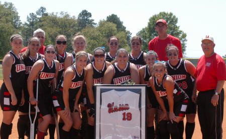 The Union softball team gathers around the lone senior of 2007, Kristen Kolter (19) during senior day. - Photo by Steven Aldridge