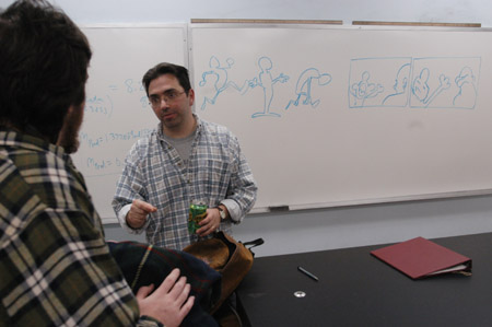 Kirby Atkins speaks with DMS major Jonathan Callis shortly after his talk on computer animation and digital filmmaking. - Photo by Jim Veneman