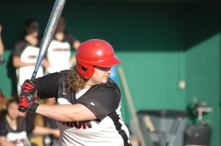 Senior Kristen Kolter prepares to swing at a pitch during Union's double-header sweep over Freed-Hardeman. - Photo by Steven Aldridge