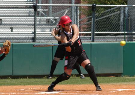 Brandy Hoffman eyes the ball as she starts her swing. - Photo by Steven Aldridge