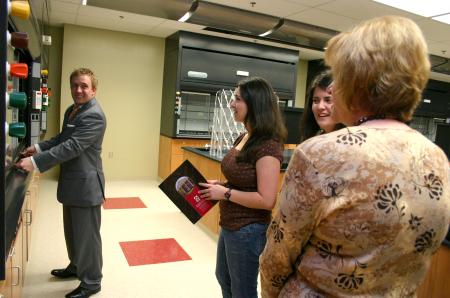 Students showed off the details of the new chemistry facilities in White Hall after the dedication ceremony. - Photo by Stephanie Schroeder