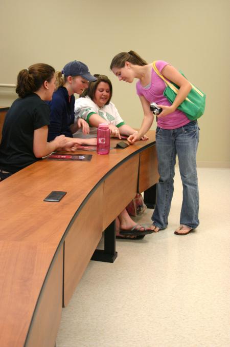 Students checked out the features in one of the new classrooms in White Hall after the dedication ceremony. - Photo by Stephanie Schroeder