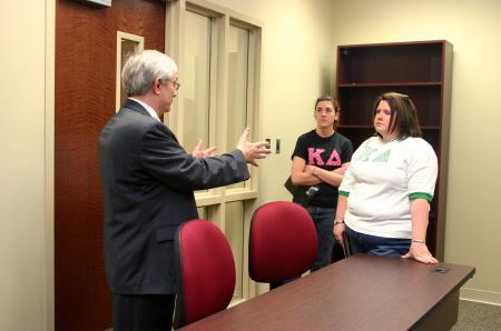 Biology Professor James Huggins describes the new possibilities for students in the new $20 million White Hall. Students had a chance to tour the building prior to the conclusion of the spring semester. - Photo by Stephanie Schroeder
