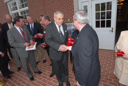 Union University President David S. Dockery congratulates lead donor Roy L. White after the dedication ceremony for White Hall. The new $20 million building was named in White's honor. - Photo by Morris Abernathy