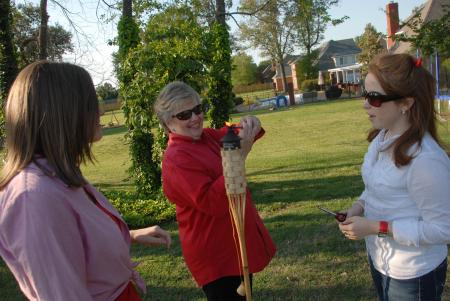 First Lady Lanese Dockery lights torches around her backyard for the Happy Trails event. - Photo by Morris Abernathy