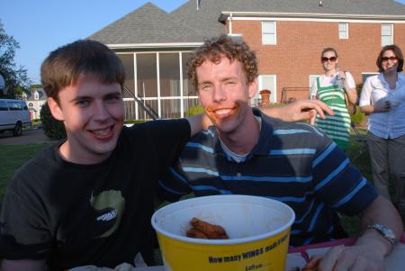 Richard Hart and Douglas Martin show off their messy grins after the wings eating competition at Happy Trails. - Photo by Morris Abernathy