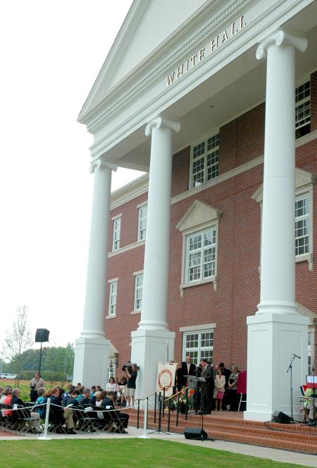Minister to the University Todd Brady offers up a prayer of dedication for White Hall.  - Photo by Matthew Diggs