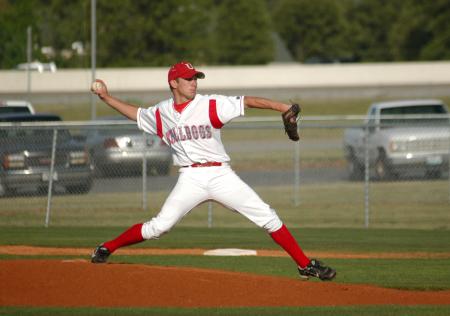 Junior pitcher James Brasfield strides to the plate during his delivery. - Photo by Steven Aldridge