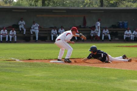 Junior Shaun Cozart tags out a runner returning to base in a game versus Lambuth University (Tenn.). - Photo by Steven Aldridge