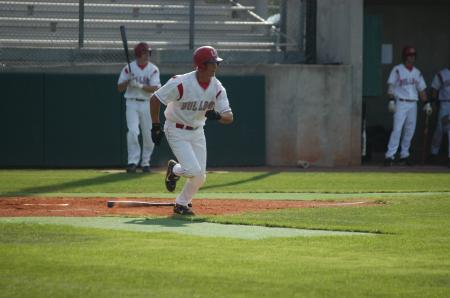 Joe Robinson takes off for first base after making contact. - Photo by Steven Aldridge