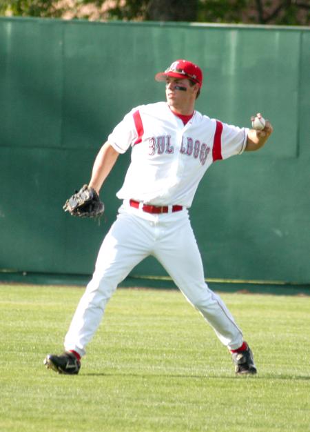 Judson Powers gets the ball back into the infield after making a catch in centerfield. - Photo by Steven Aldridge