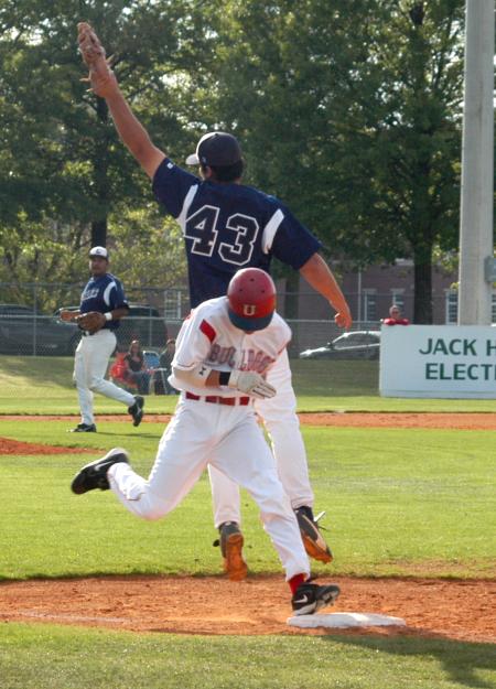 Union outfielder Cody Willoughby is safe at first after good hustle when the throw pulls the first baseman off the bag. - Photo by Steven Aldridge