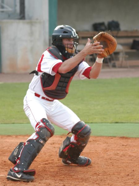 Allen Williams gets set to receive a throw at home plate during Union's pre-game infield session. - Photo by Steven Aldridge