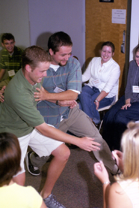 Freshman Adam Vietch and FOCUS Leader Patrick Feathers enjoy an active FOCUS game.
 - Photo by Kasey Carty-Campbell