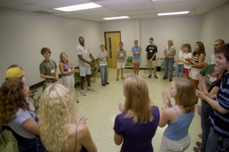 Rachel Lovelace leads her FOCUS group in an activity during New Student Orientation. - Photo by Justin Veneman