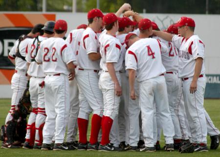 The Union baseball team huddles together prior to the start of a game. - Photo by Steven Aldridge