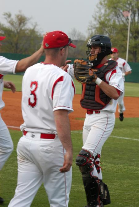 Union players come off the field after a successful defensive inning. - Photo by Steven Aldridge