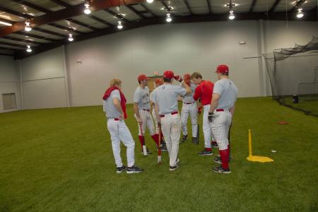 Members of the baseball team test out Fesmire Field House, their new training facility. - Photo by Morris Abernathy