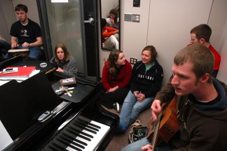 Students get together to play music in the pracitice rooms in Jennings Hall. - Photo by Beth Spain