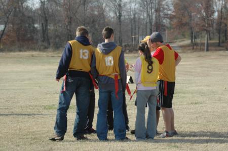 The Sophomore class enjoys playing flag football with a turkey at the annual Turkey Bowl. - Photo by Holly Gushee