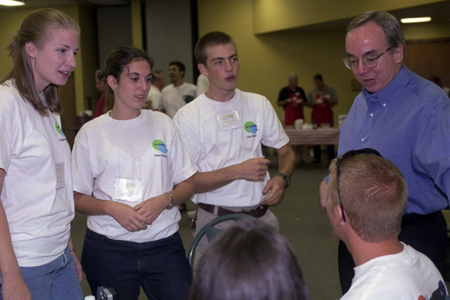 Dr. Dockery talks with new students at the annual Ice Cream Social held during New Student Orientation. Visiting with the president, from left to right, is Jenny Heineken, a Christian studies major from Pensacola, Fla.; Kayla Haug, an elementary education major from Evansville, Ind., and Josh Howerton, a Biblical studies major from Bowling Green, Ky. - Photo by Janelle Sou