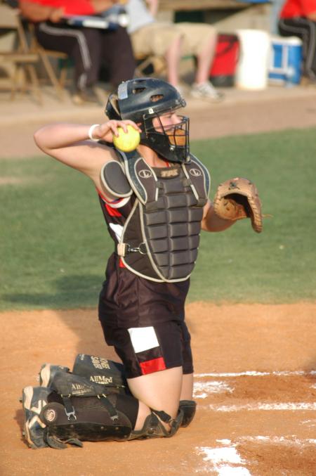 Union catcher Candice Thompson tosses the ball back to the pitcher. - Photo by Steven Aldridge