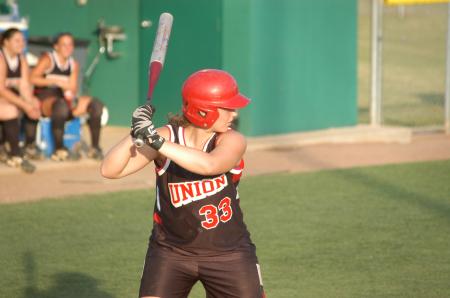 Freshman catcher Candice Thompson stands ready for a pitch. - Photo by Steven Aldridge