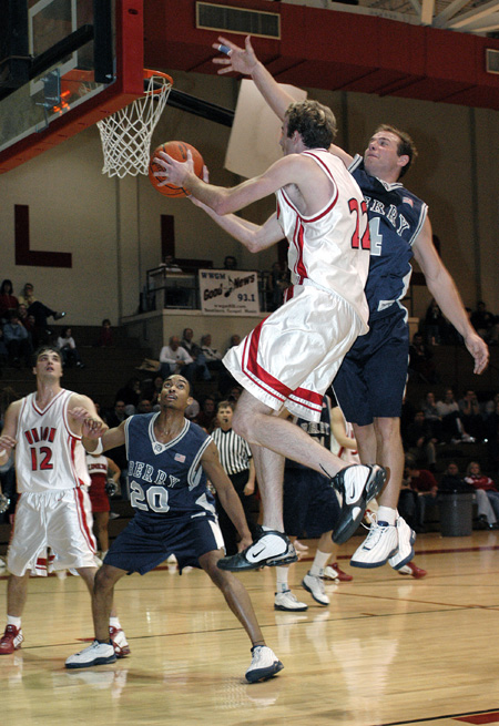 Matt Noah (22) - senior guard from Florence, Ala. & Michael Katrosh (12) - senior guard from Bolivar Missouri - Photo by Jim Veneman