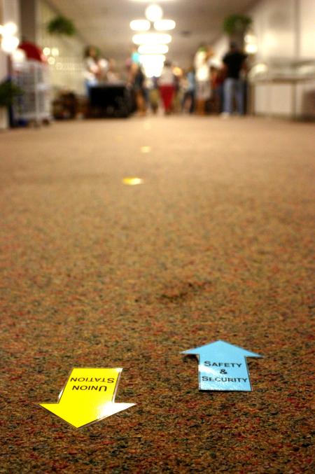 Little arrows around campus provided directions to the various offices to complete the necessities of being a new student at Union University. - Photo by Stephanie Schroeder