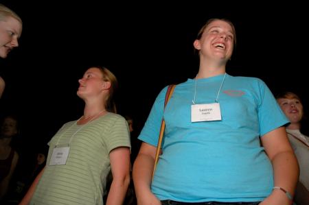 Freshmen Anna Wicker and Lauren Smith gets to know some other incoming students at an ice cream break after the family worship service during orientation. - Photo by Neisha Fuson