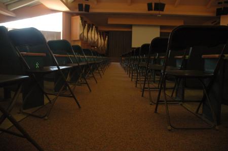 The chapel had to be filled with an extra row of chairs for the family chapel service during orientation. - Photo by Neisha Fuson