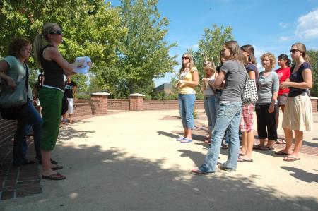 Sophomore Public Relations Major Elizabeth Wood explains the rules of a scavenger hunt to her Focus group. - Photo by Neisha Fuson