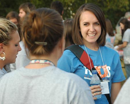 Senior Focus group leader Erin Brassart, English major, interacts with her group of new students during the ice cream social held at President Dockery's home.  - Photo by Matthew Diggs